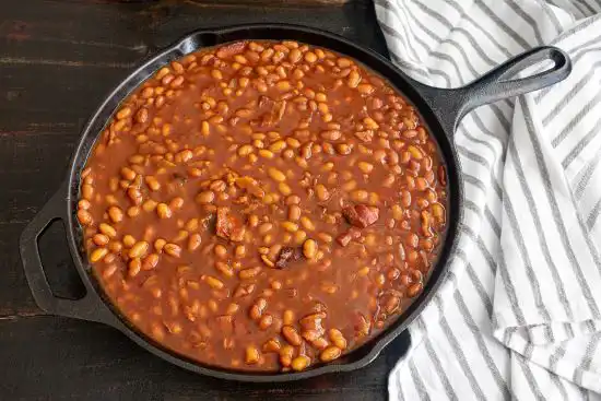 cast iron skillet with baked beans