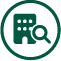 green building and magnifying glass icon