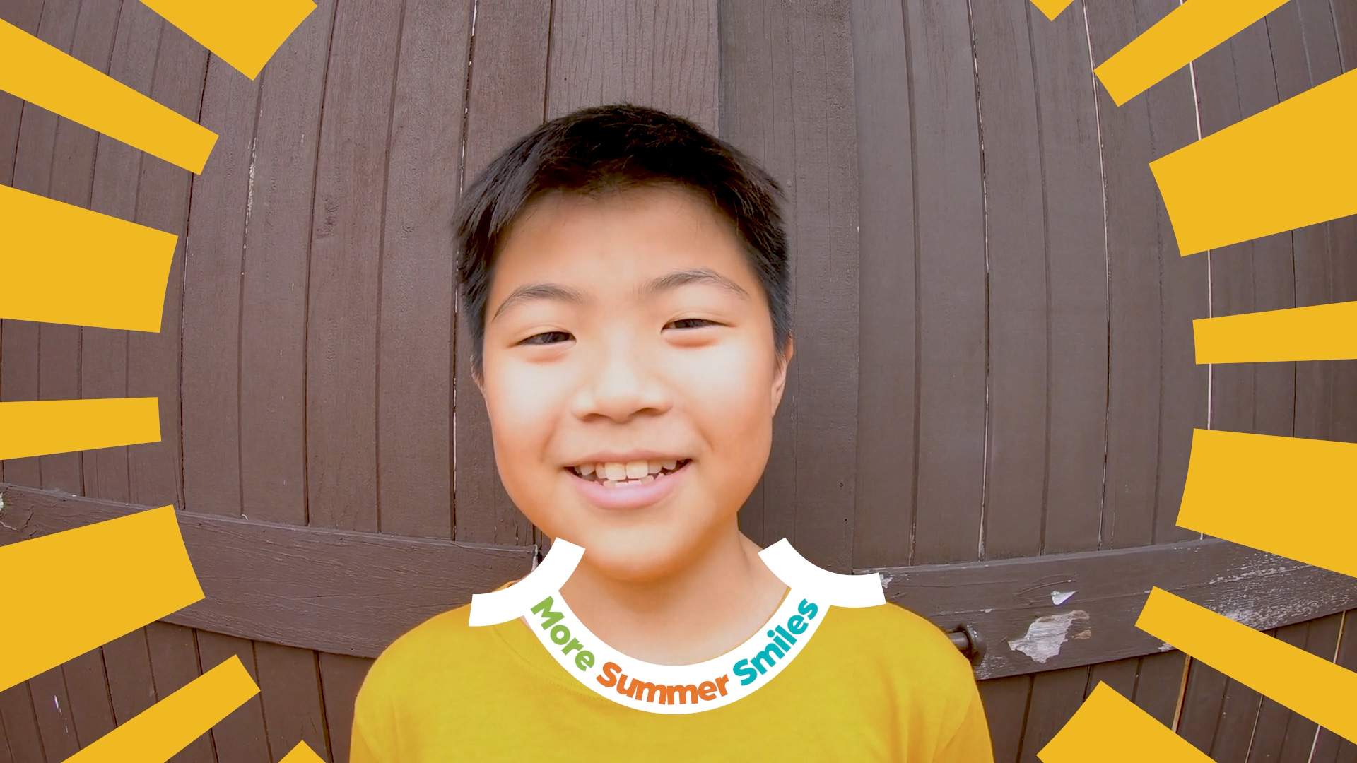 video thumbnail showing a smiling boy with the words "More Summer Smiles" surrounded by yellow sunbeams