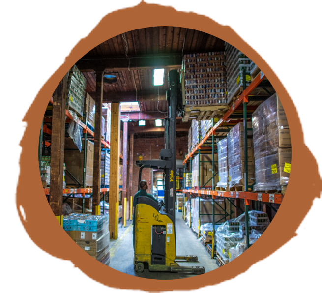 man using a forklift in a food warehouse on a brown paintbrush circle background