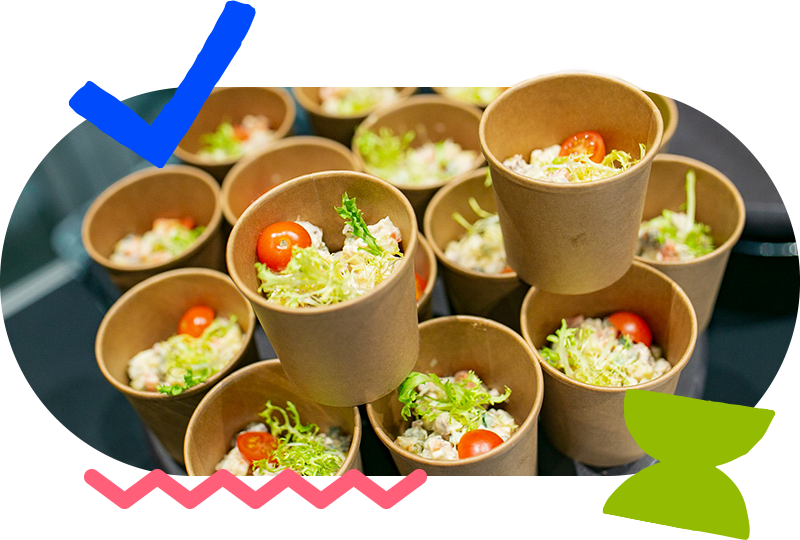 salad portioned in small cups for sampling