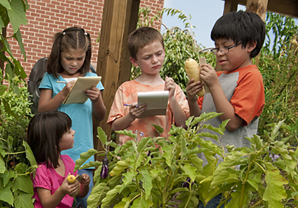 student gardening
