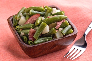 bowl with green beans, potatoes, onions and turkey