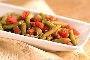 dish of green beans and diced tomatoes
