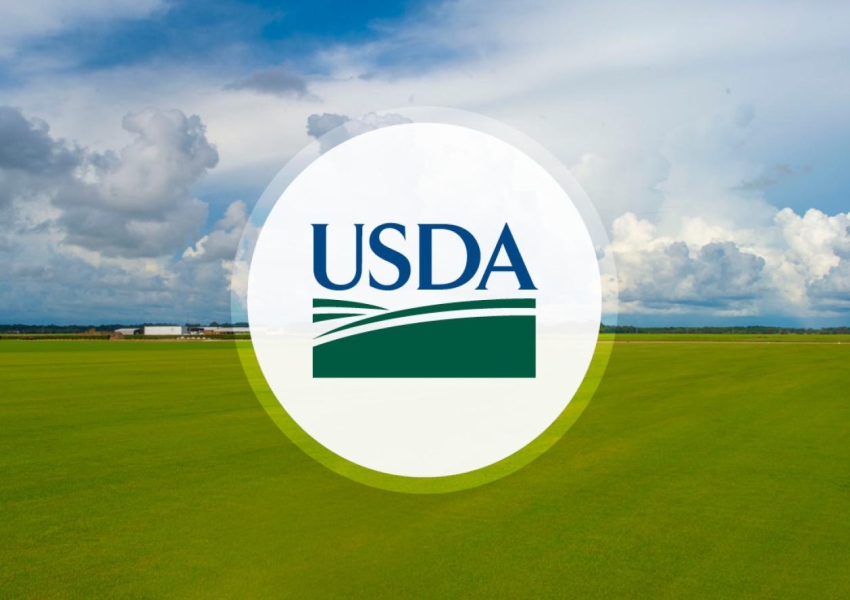 USDA logo on a white circle with a farm in the background