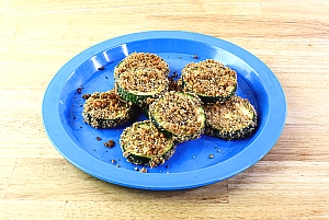 parmesan zucchini chips on a plate