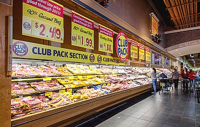 shoppers in the meat aisle of a grocery store in Fairfax, VA